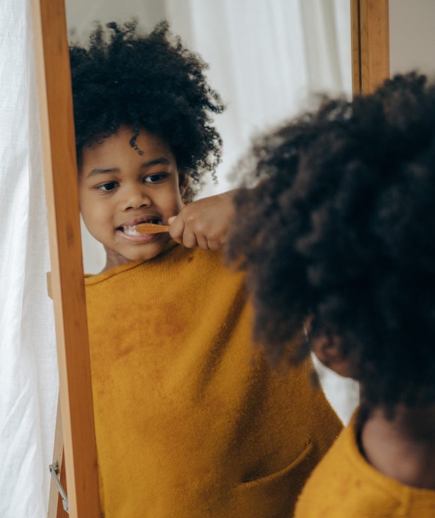 kid brushing teeth