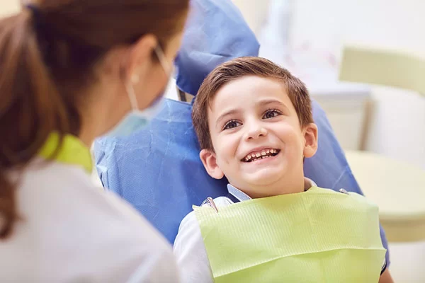 kid at the dentist for pediatric dentistry