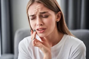 feeling the symptoms of gum disease