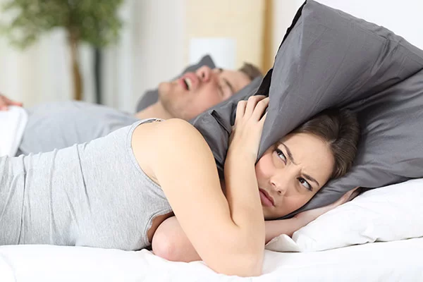 partner distubed by partner's loud snoring